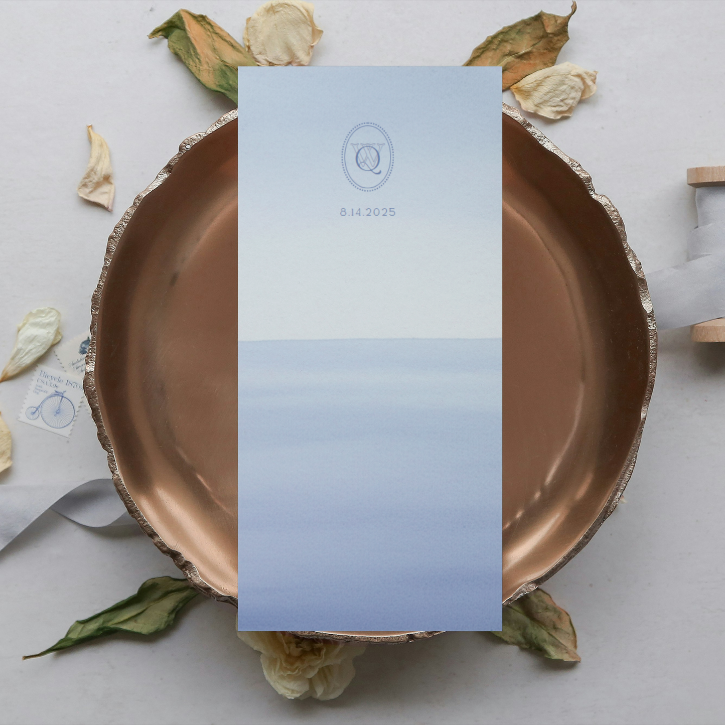 Vintage Blue Wedding Table Stationery Pack showing a menu template. It's in a soft classic coastal blue style with a watercolor motifs.